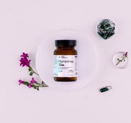 Opakowanie produktu Floradrop na różowym tle.