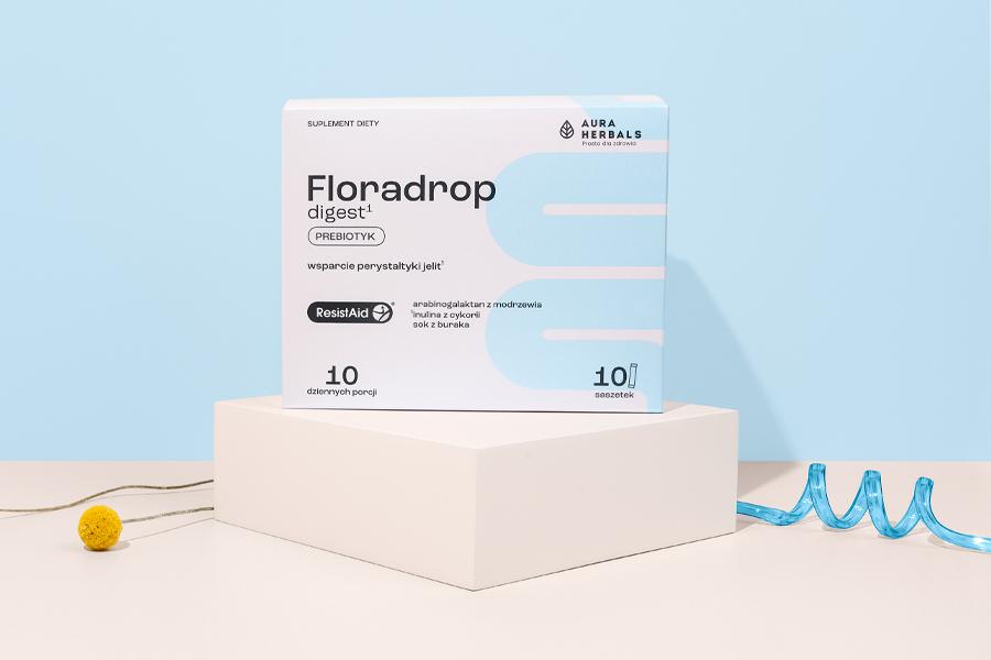 Opakowanie produktu Floradrop na niebieskim tle.