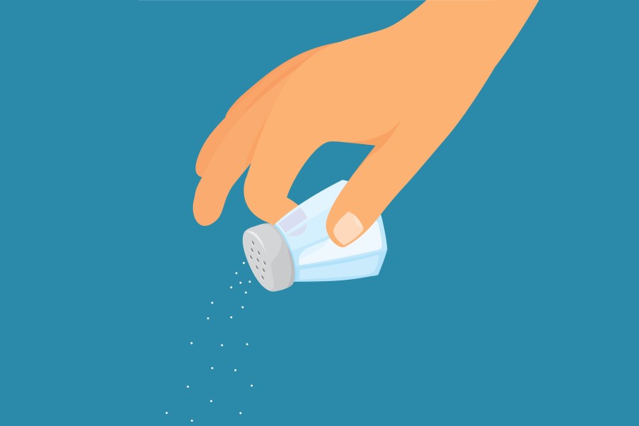 Rysunkowa ręka trzymająca solniczkę.