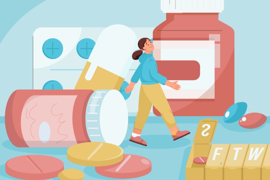 Rysunkowa postać kobiety przechadza się pośród opakowań leków.